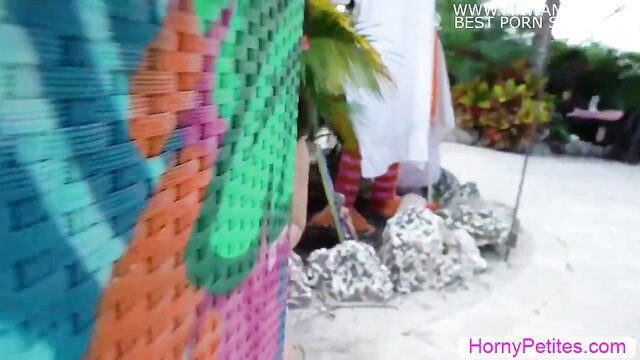 Teen Asian Mina Moon poolside tease in colorful bikini
