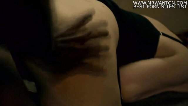 Closeup of woman's curvy ass and hip in lingerie from BBC orgasm video