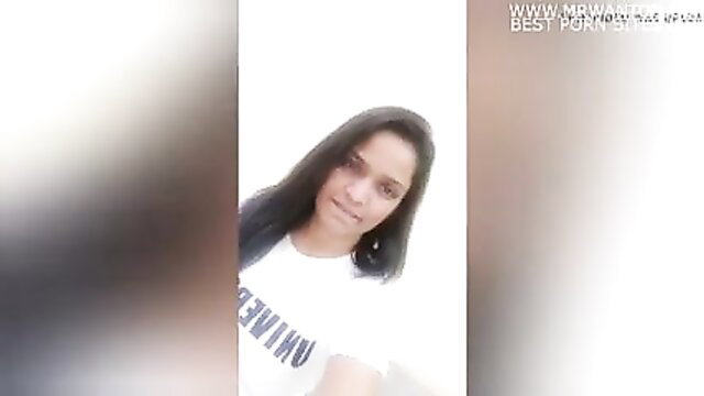 Indian beauty in tight white Uninev t-shirt selfie, long dark hair