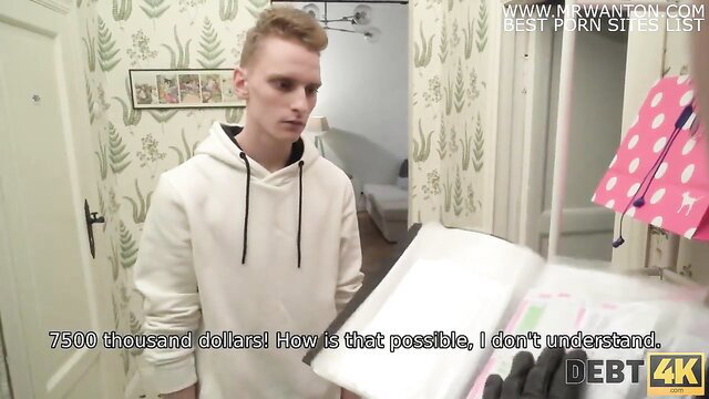 Candy Kay shocked by 750k debt in Debt4k, guy in hoodie stares at docs