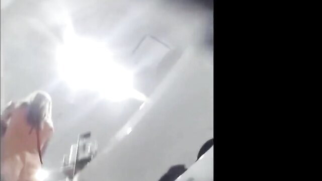 Upskirt view of two blonde sluts exposing panties in bright light