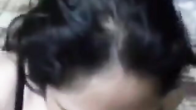 Blurry closeup of sexy Bangla village girl's face with dark hair