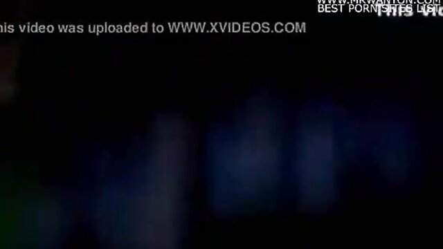 Blurry dark adult video thumbnail with XVideos watermark