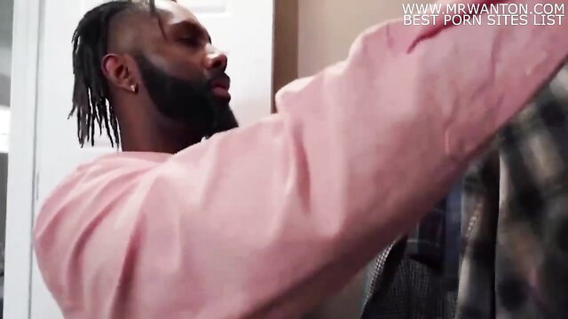 Black man in pink hoodie grabs cheating blonde wife in closet