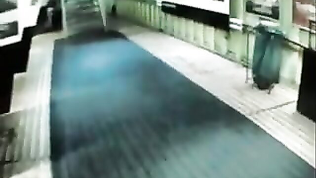 Secretary Gisela in short skirt on office corridor