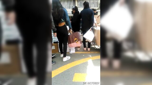 Thick Venezuelan women with huge asses in tight pants shopping outdoors