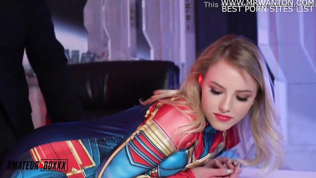 Dixie Lynn as blonde teen Captain Marvel in tight cosplay bent over