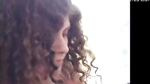 Curly haired college girl profile in bus flashing video thumbnail