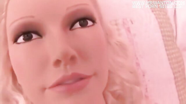 Closeup of sexy blonde babe with pink glossy lips and heavy makeup