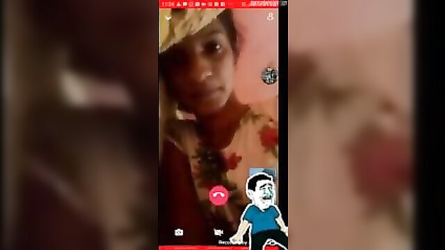 Blurry Nangi Baba 2 leak thumbnail: African woman in colorful dress with hat on video call