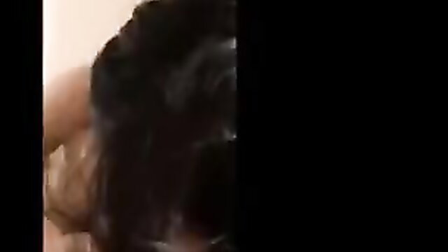 Singaporean woman with black hair blows man while on phone call
