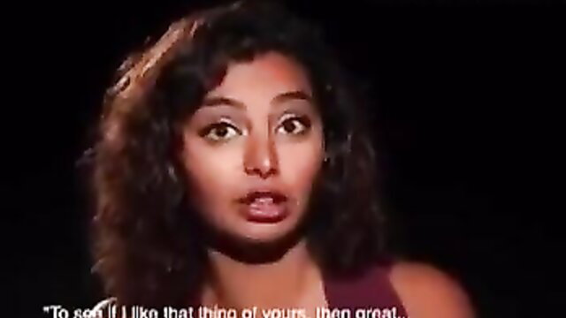 Egyptian girl with curly hair in tank top tells harassment story