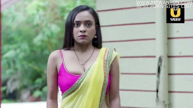 Hot Indian wife in sheer yellow saree and pink blouse, deep cleavage tease