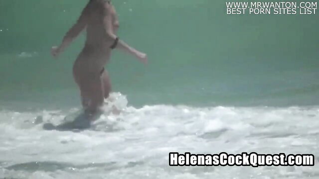 Helena Price nude walking in ocean waves, public tease