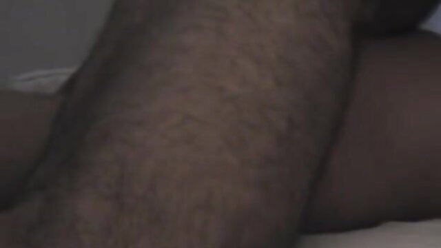 Belen Rodriguez lying nude with thick hairy legs spread on bed