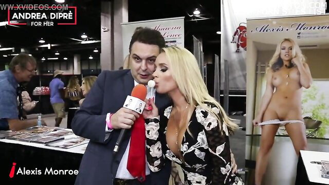 Alexis Monroe kisses Andrea Dipre at booth in sexy lace dress