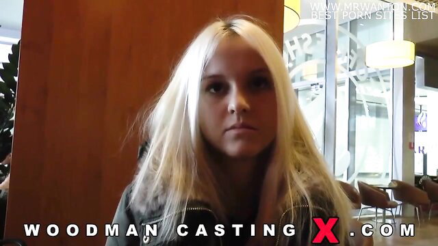 Blonde teen in Woodman Casting interview, nervous face closeup