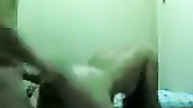 Blurry Indonesian amateur sex scene with woman on bed