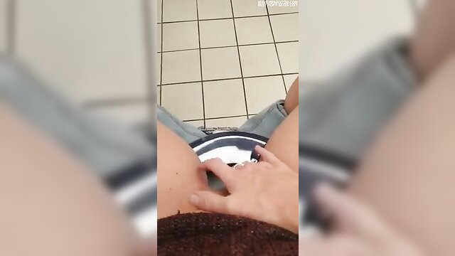 Amateur wife masturbates fingering pussy in work toilet