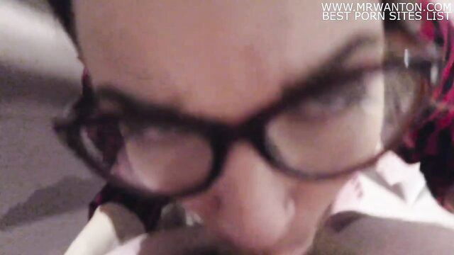 Sloppy nerdy teen with glasses slurps cum closeup POV