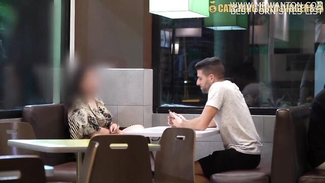 Hot Colombian BBW in tight top chats with guy at table