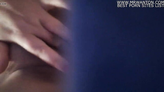 Closeup handjob on erect cock blurred blue overlay HD porn thumbnail
