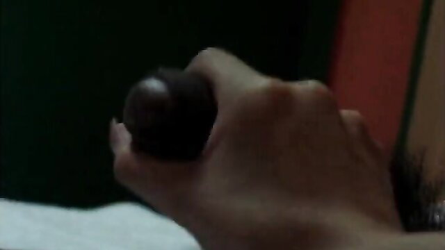 Hot Asian Korean amateur hand gripping large dark nipple closeup