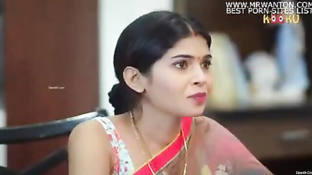 Indian beauty in sheer red saree and blouse, seductive gaze