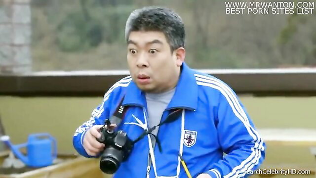 Shocked Asian man in Adidas tracksuit holding camera, Yoon Seol-hee 7 Princess Driver