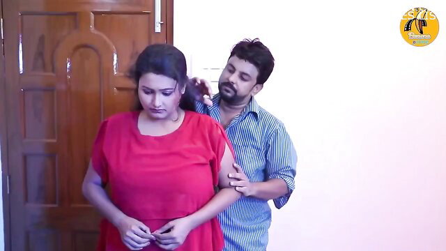 Indian couple in red dress embracing intimately, softcore tease