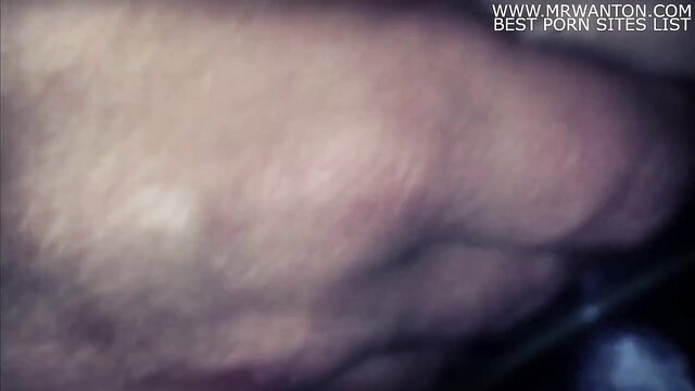 Blurry closeup of woman's pale ass and thigh in explicit pose