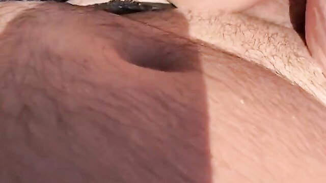 Closeup of man's hairy belly and erect cock during outdoor picnic fuck