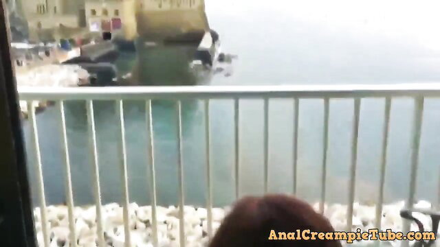 Big ass brunette enjoys anal creampie on vacation balcony