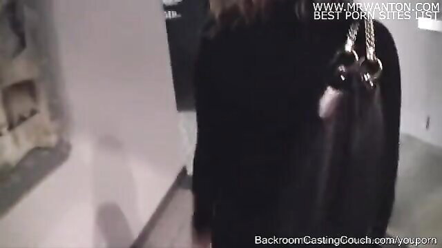 Pretty Asian model in black dress with chain purse explores porn casting couch