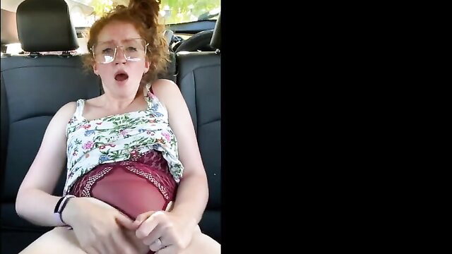Nerdy redhead Alberta plays with pussy in car, real amateur