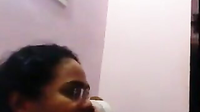 Closeup of black amateur teacher in glasses sucking cock POV