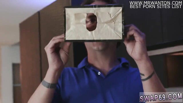 Man holds torn envelope glory hole mask over face in taboo dad pal daughter tease