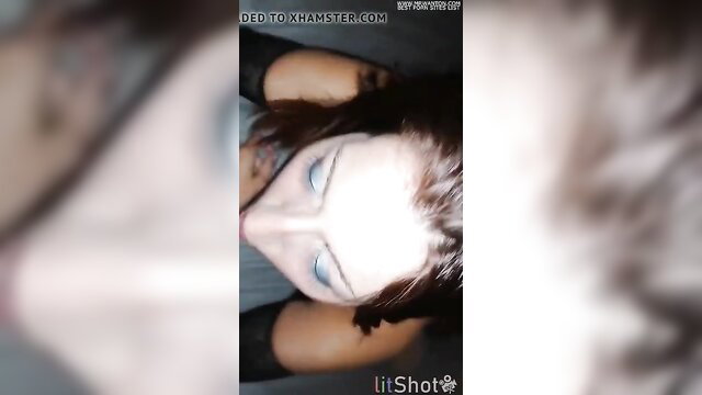 Closeup of hot wife with blue eyes and red hair in steamy amateur blowjob