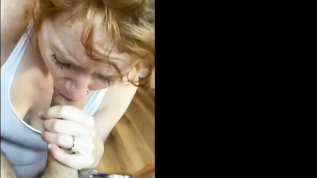 Real redhead amateur MILF kneels praying pose sucking dick closeup