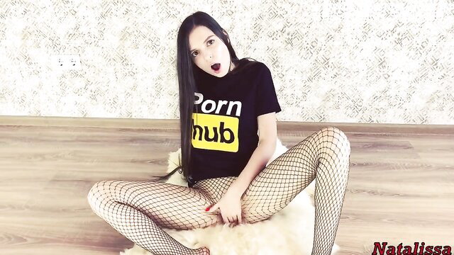 Natalissa in Pornhub tee spreads legs in fishnets home alone