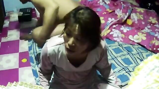 Amateur homemade mature Asian couple in explicit oral sex on bed