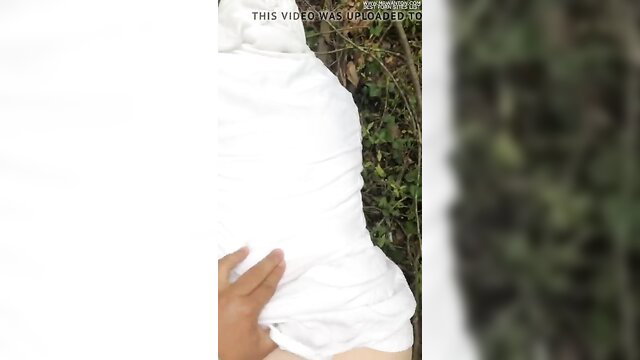 Arab hijab mom outdoor woods hand on wet white dress upskirt