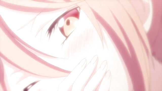 Closeup of seductive pink-haired hentai girl's blushing face and golden eyes