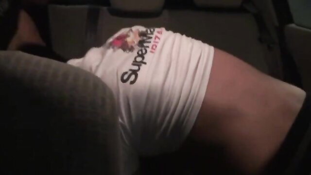 French twink in white Super 1974 tee pulled up exposing ass in car seat