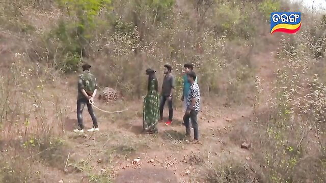 Blindfolded Indian lady tied up in BDSM outdoors with men