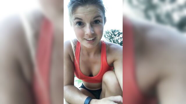 Hannah Barron hot selfie in tight red sports bra cleavage outdoor