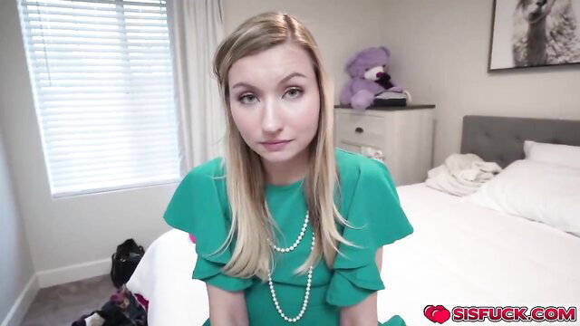 Blonde Emma in green dress teases sinful desires with teddy bear