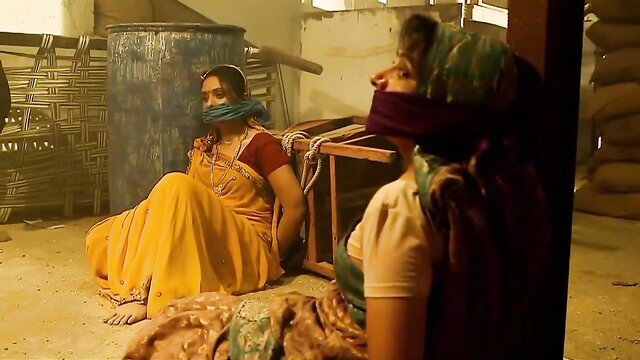 Two bound Indian women gagged in saris BDSM scene