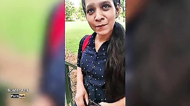 Indian college girl with big tits in park, smiling seductively