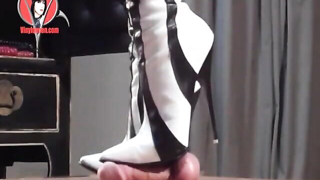 Domme in white black stiletto boots trampling slave's cock BDSM trample
